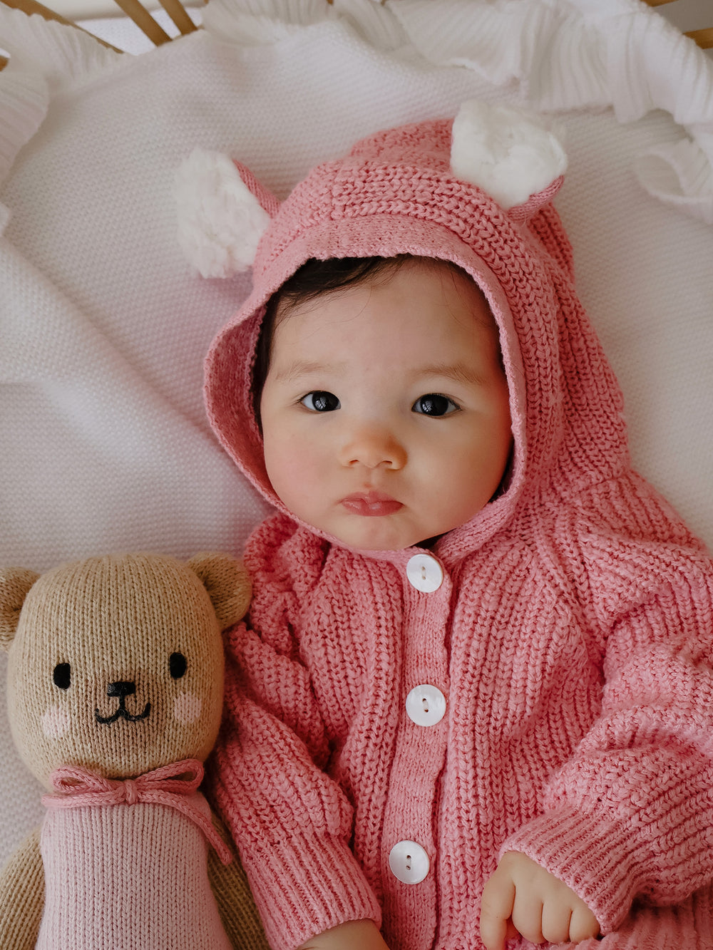 Pink Beary Sweet Suit chunky cotton knit hooded jumpsuit with fluffy bear ears and a button placket.