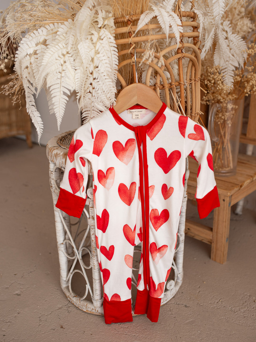 Love You More – Red Heart Onesie