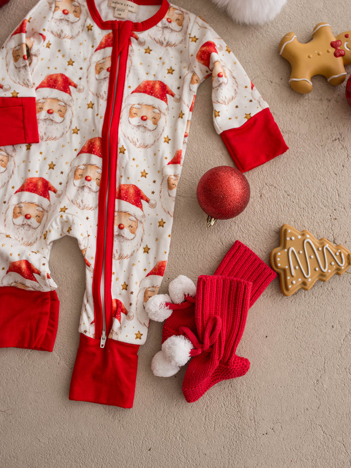 All I Wish Dear Santa baby onesie, watercolour Santa faces and gold stars on cream - Before & Ever Kids