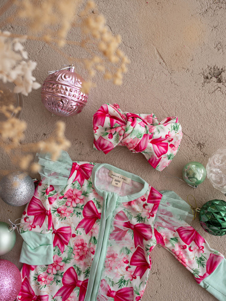 All I Wish Pink Bow topknot headwrap shown with the matching onesie and the rest of the range - Before & Ever Kids