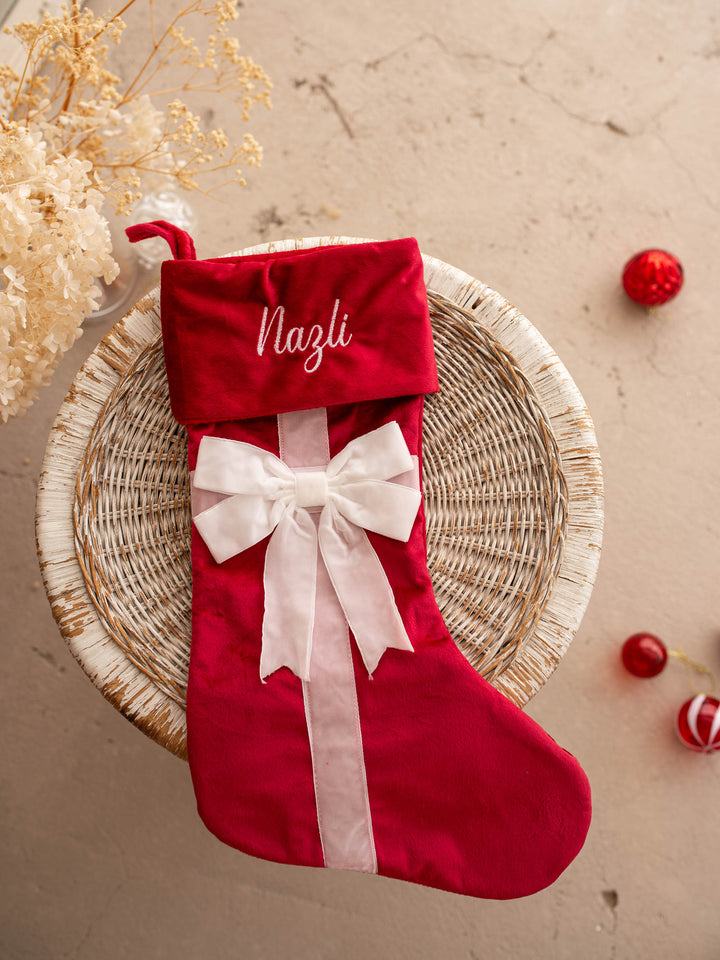 All Wrapped Up personalised Christmas stocking, red velvet with a white ribbon and bow, name embroidered on the cuff - Before & Ever Kids
