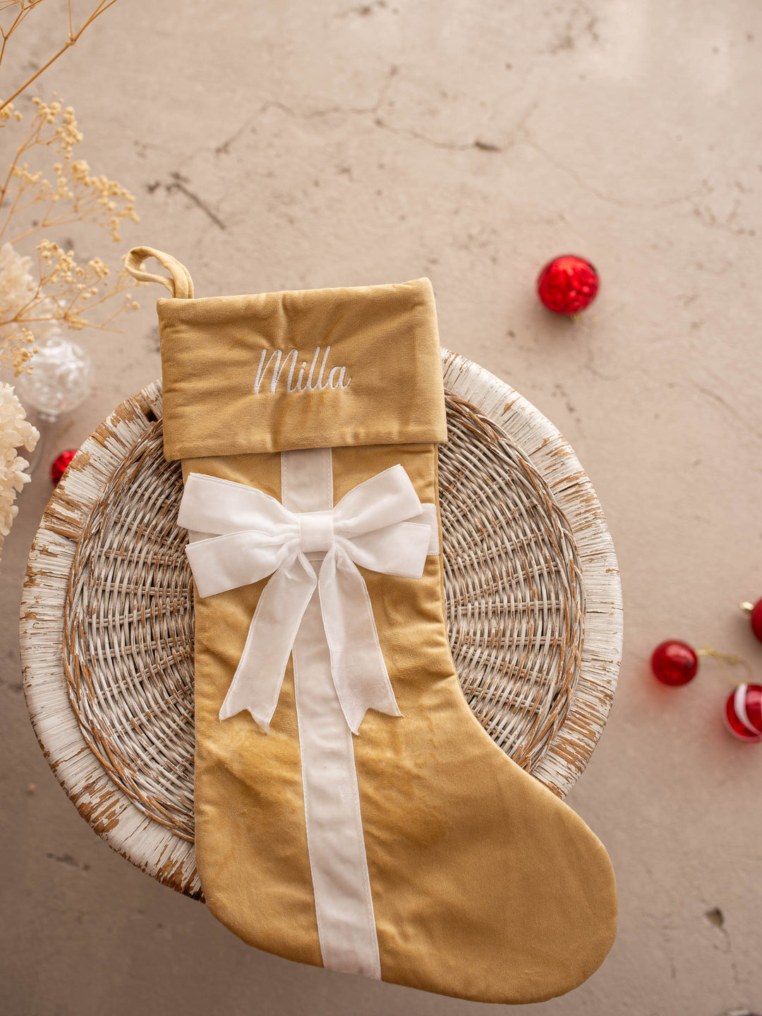 All Wrapped Up personalised Christmas stocking, gold velvet with a white ribbon and bow, name embroidered on the cuff - Before & Ever Kids