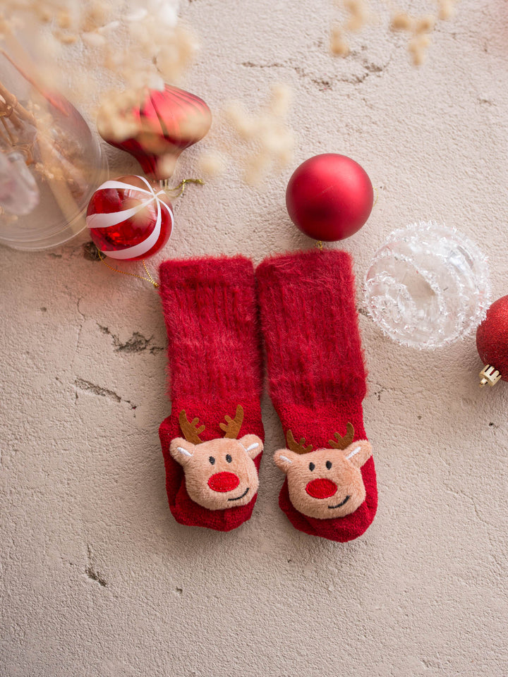 Baby Rudolph red fluffy baby socks, plush reindeer face with brown antlers and a red nose - Before & Ever Kids