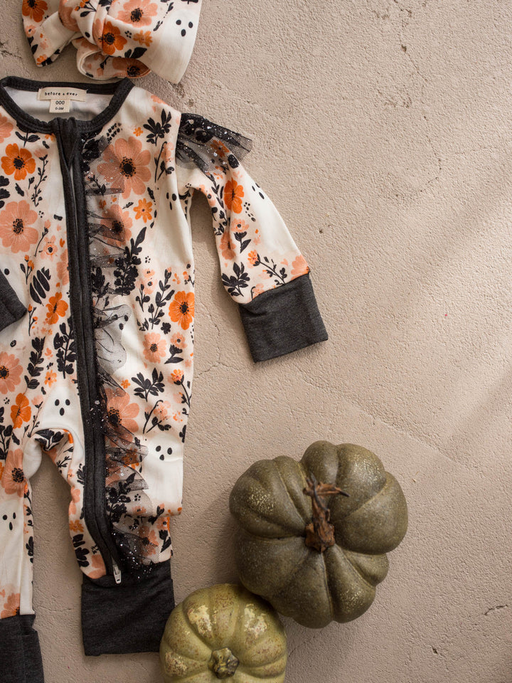 Boo-quet ivory floral bamboo baby girl onesie flat lay with green pumpkins - Before & Ever Kids