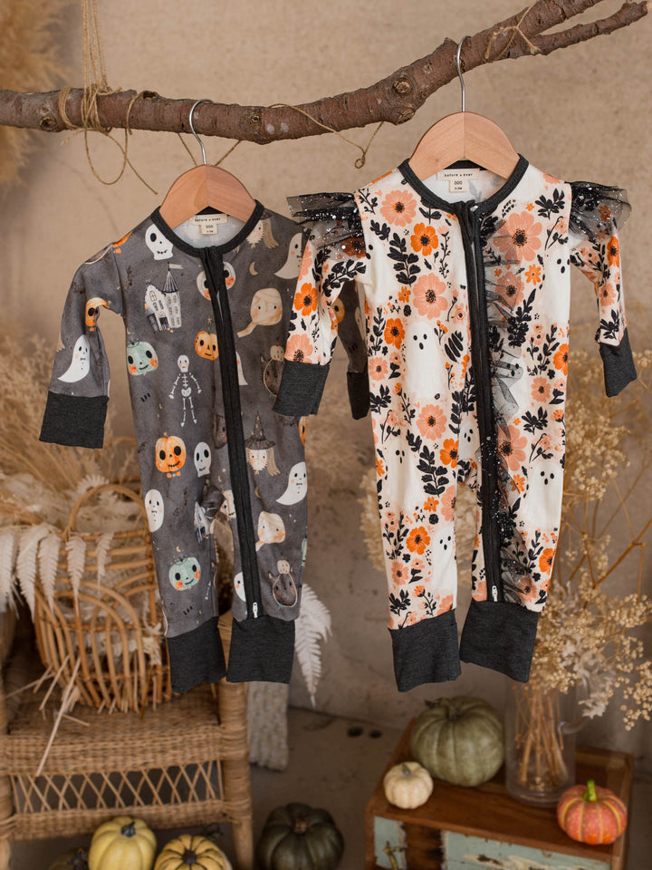 Boo-quet and Boo Crew matching Halloween baby onesies hanging together - Before & Ever Kids