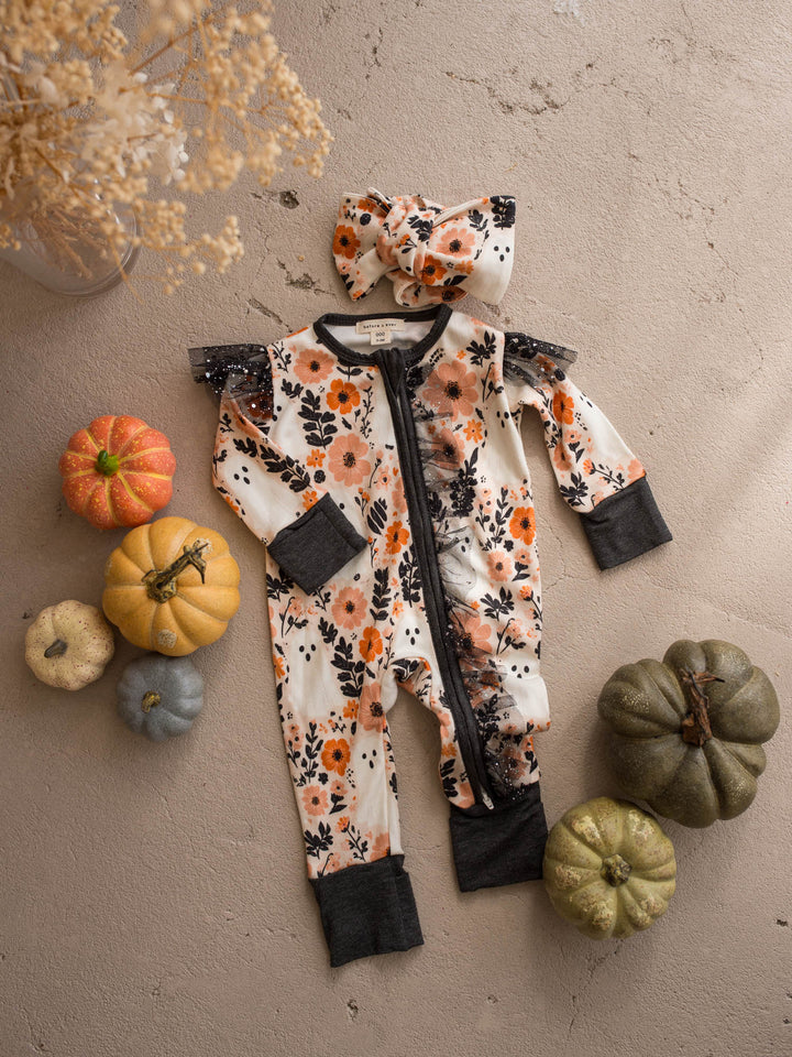 Boo-quet topknot headwrap flat lay with the matching floral baby onesie - Before & Ever Kids