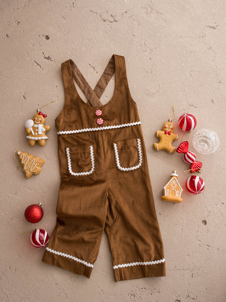 Catch Me If You Can caramel velvet boy overall, laid flat, full front, with white ric rac trim and peppermint candy buttons - Before & Ever Kids