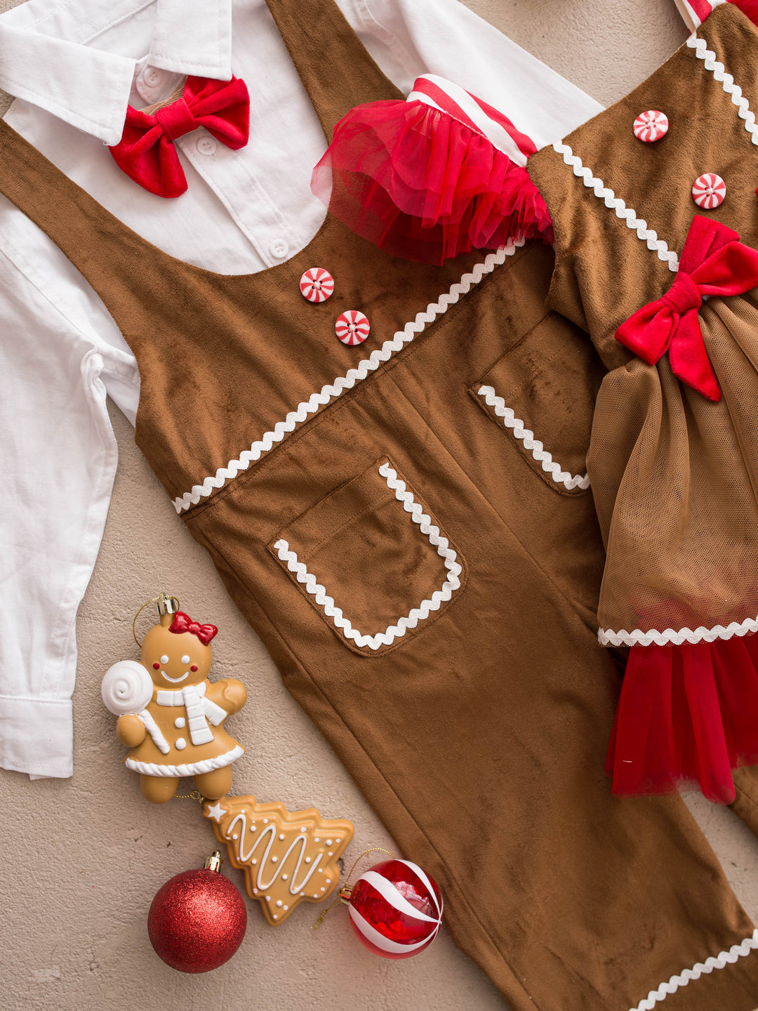 Catch Me If You Can caramel velvet boy overall, flat beside a gingerbread dress - Before & Ever Kids