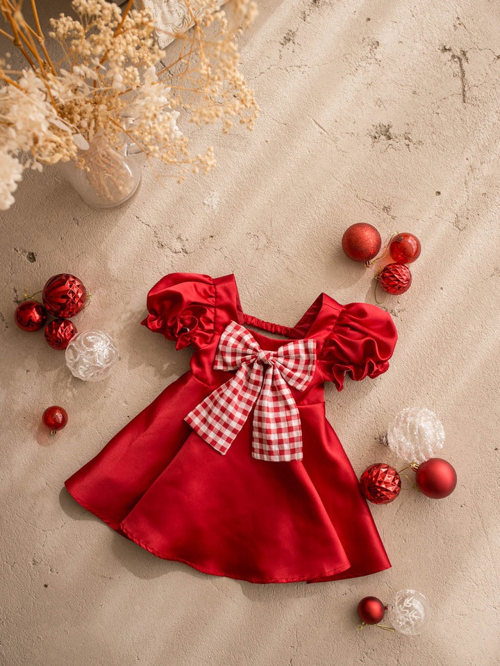 Cherry on Top red front view, red satin dress with puff sleeves and a red gingham bow at the front - Before & Ever Kids
