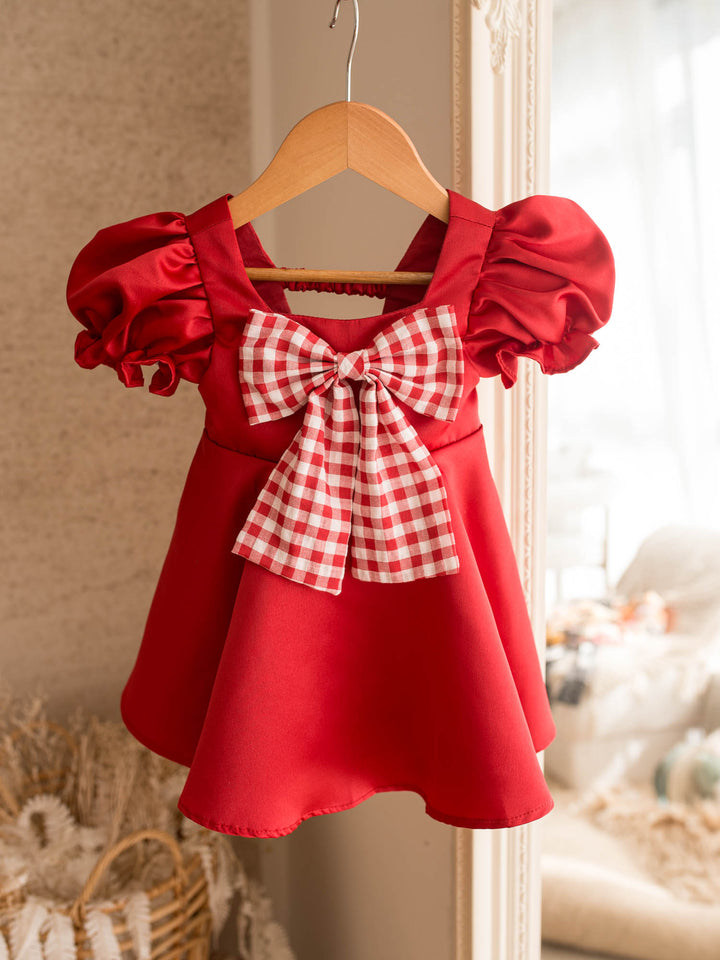 Cherry on Top red red satin dress with puff sleeves and a red gingham bow at the front - Before & Ever Kids