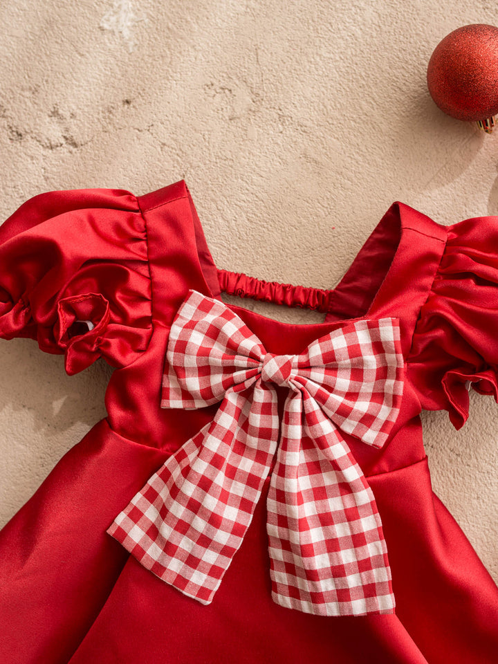 Cherry on Top red red satin dress with puff sleeves and a red gingham bow at the front - Before & Ever Kids