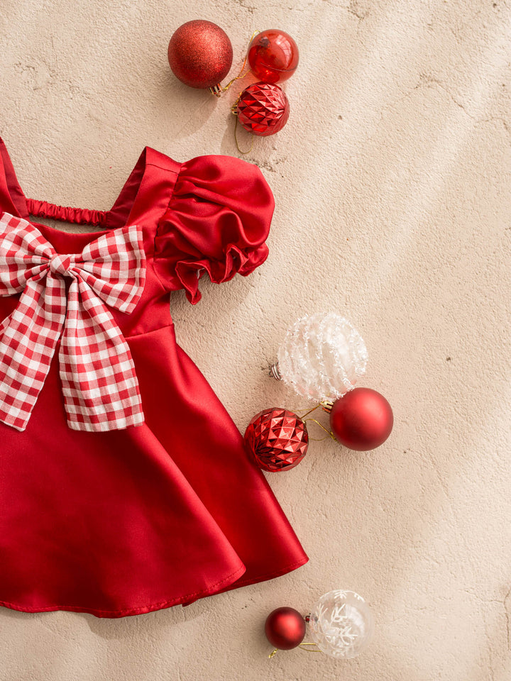 Cherry on Top red red satin dress with puff sleeves and a red gingham bow at the front - Before & Ever Kids
