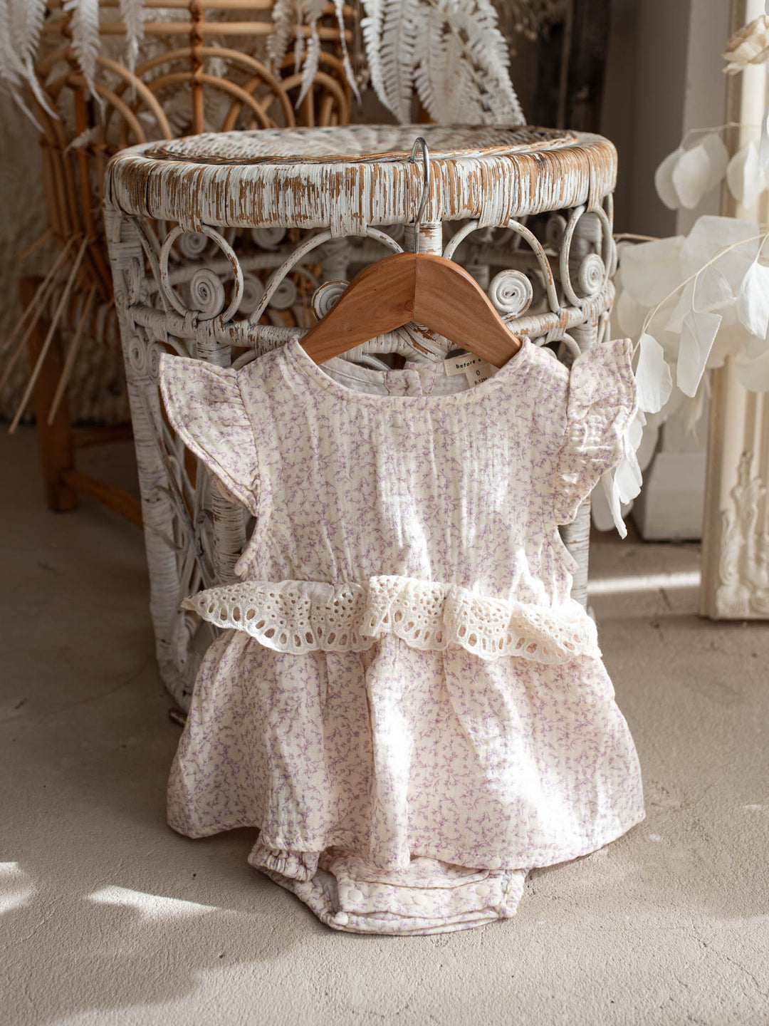 Dainty Miss Lavender Mae baby girl lavender floral cotton gauze romper with eyelet lace ruffle and flutter sleeves - Before & Ever Kids