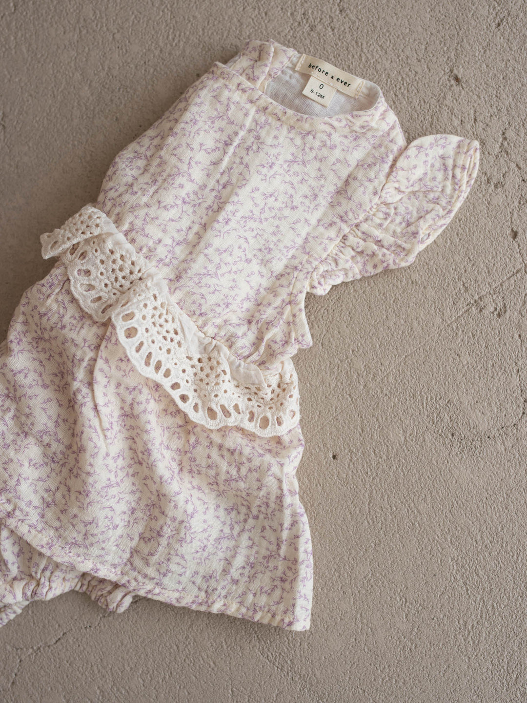 Dainty Miss Lavender Mae baby girl lavender floral cotton gauze romper with eyelet lace ruffle and flutter sleeves - Before & Ever Kids