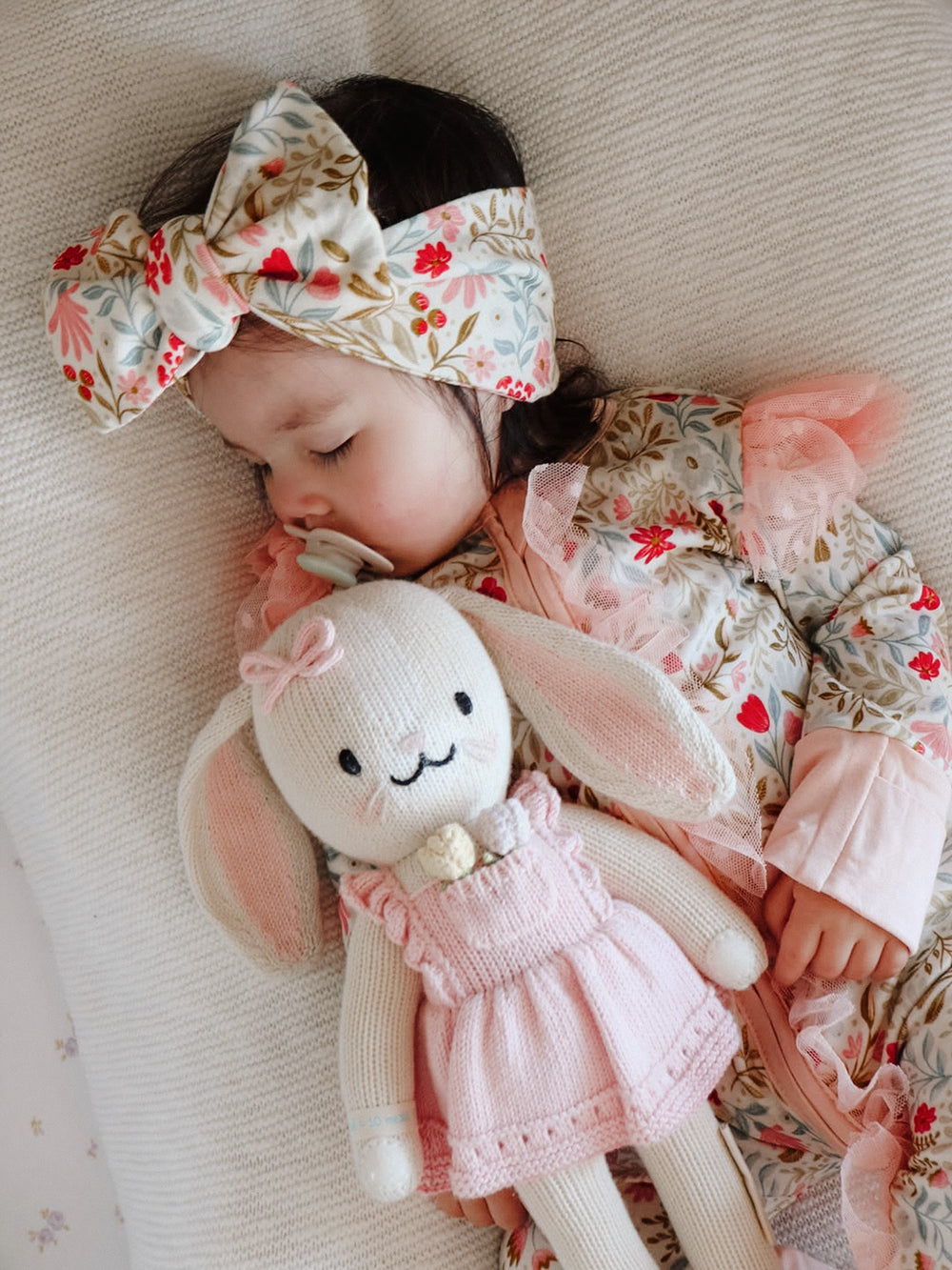 Dainty Miss wildflower floral bamboo viscose baby girl onesie with a two-way zipper, convertible mittens, footies and long sleeves.
