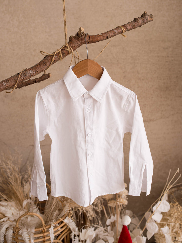 Everyday Cotton Shirt in white, boys collared cotton button shirt, hanging on a wooden hanger, full front - Before & Ever Kids