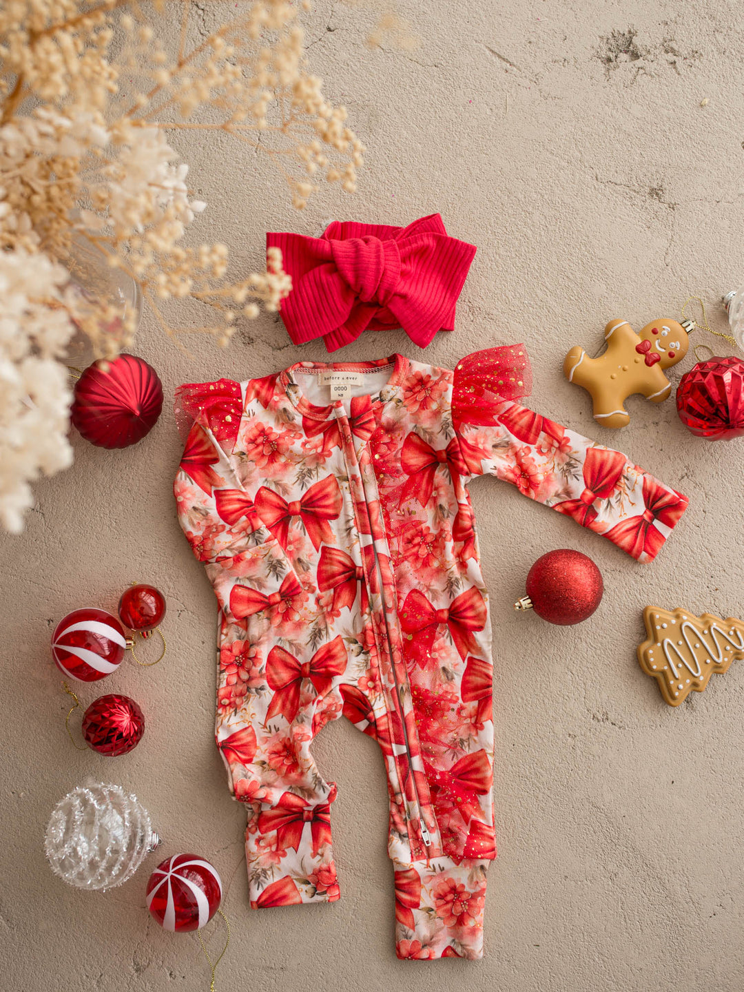 Forever Loved red ribbed topknot headwrap shown with the All I Wish Red Bow onesie - Before & Ever Kids