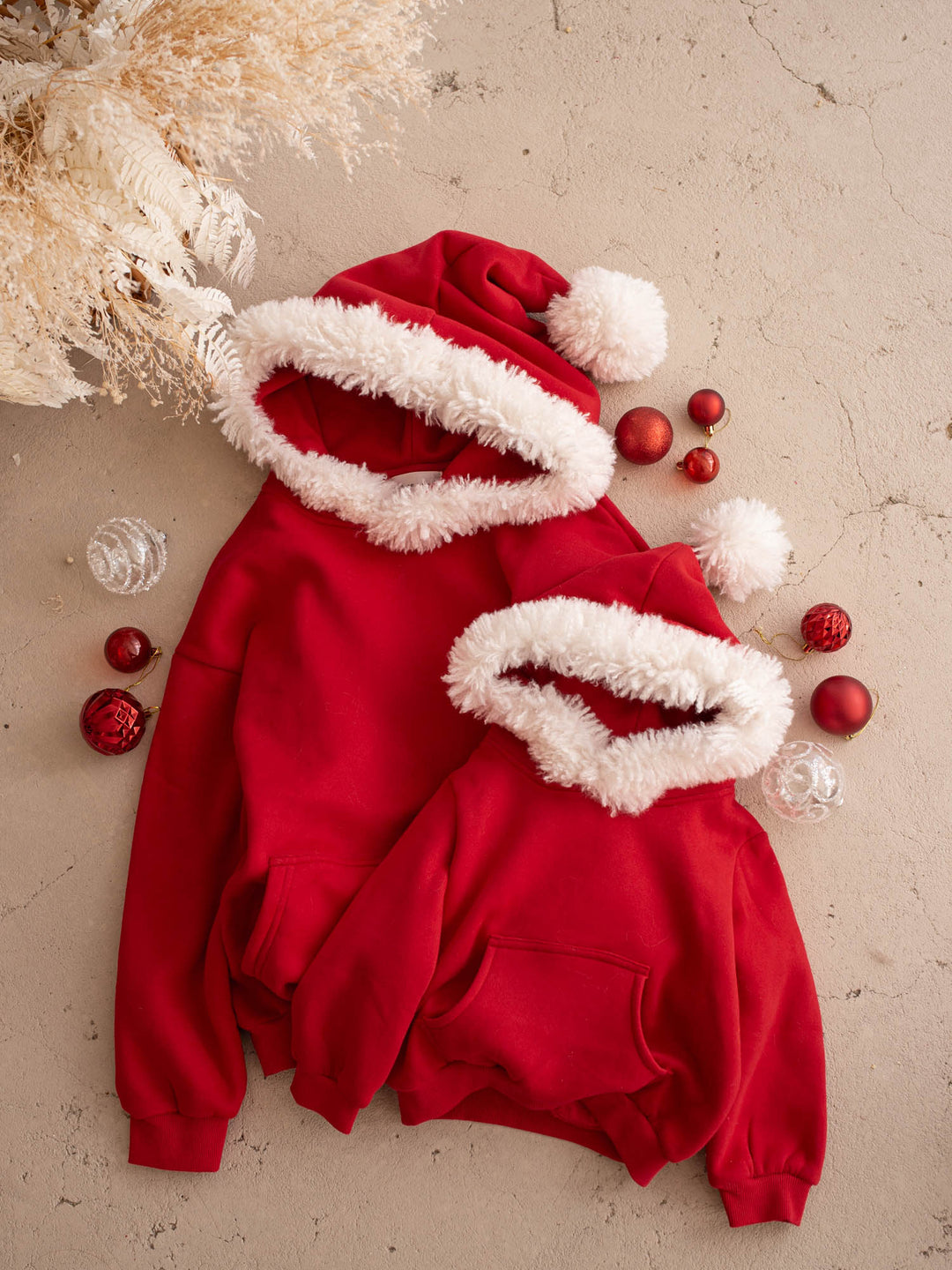 Ho Ho Hoodie adult and kids hoodies laid flat together - Before & Ever Kids