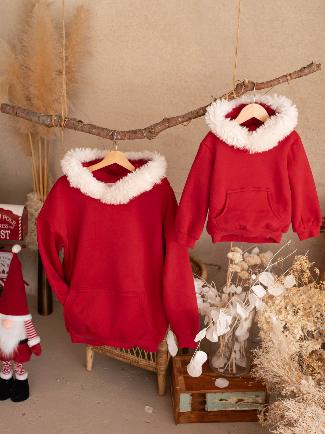 Ho Ho Hoodie adult and kids sizes hanging together on a branch - Before & Ever Kids