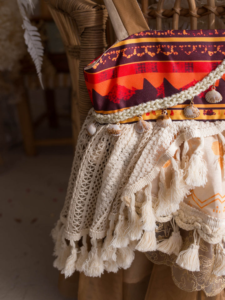 Island Princess island-inspired girls dress crochet lace and tassel close-up - Before & Ever Kids