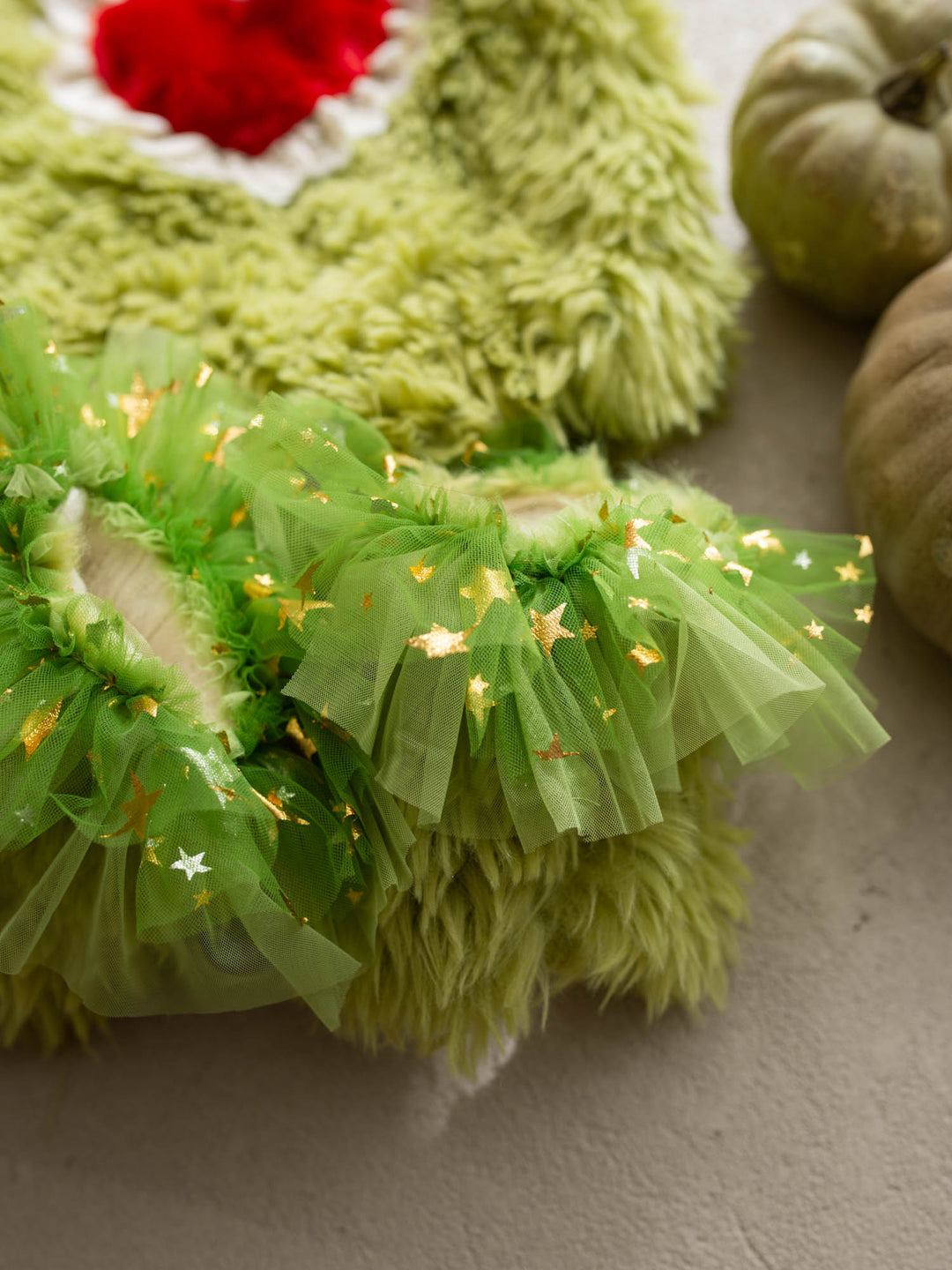 Little Grump green faux-fur baby leg warmers - Before & Ever Kids