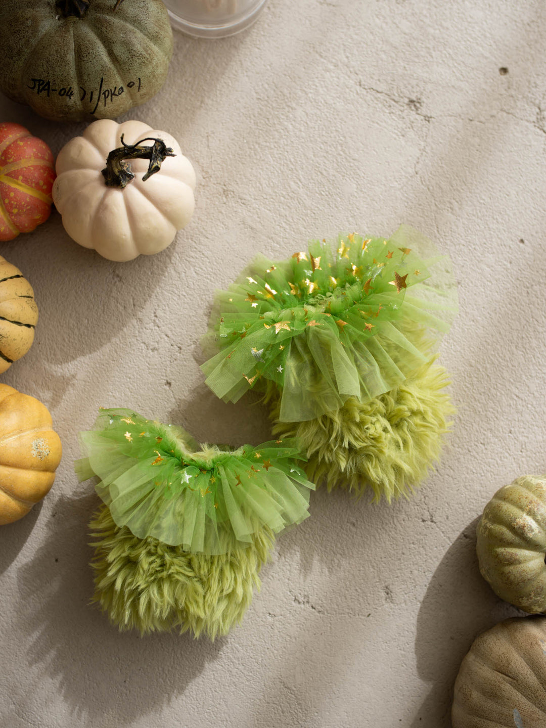 Little Grump green faux-fur baby leg warmers - Before & Ever Kids