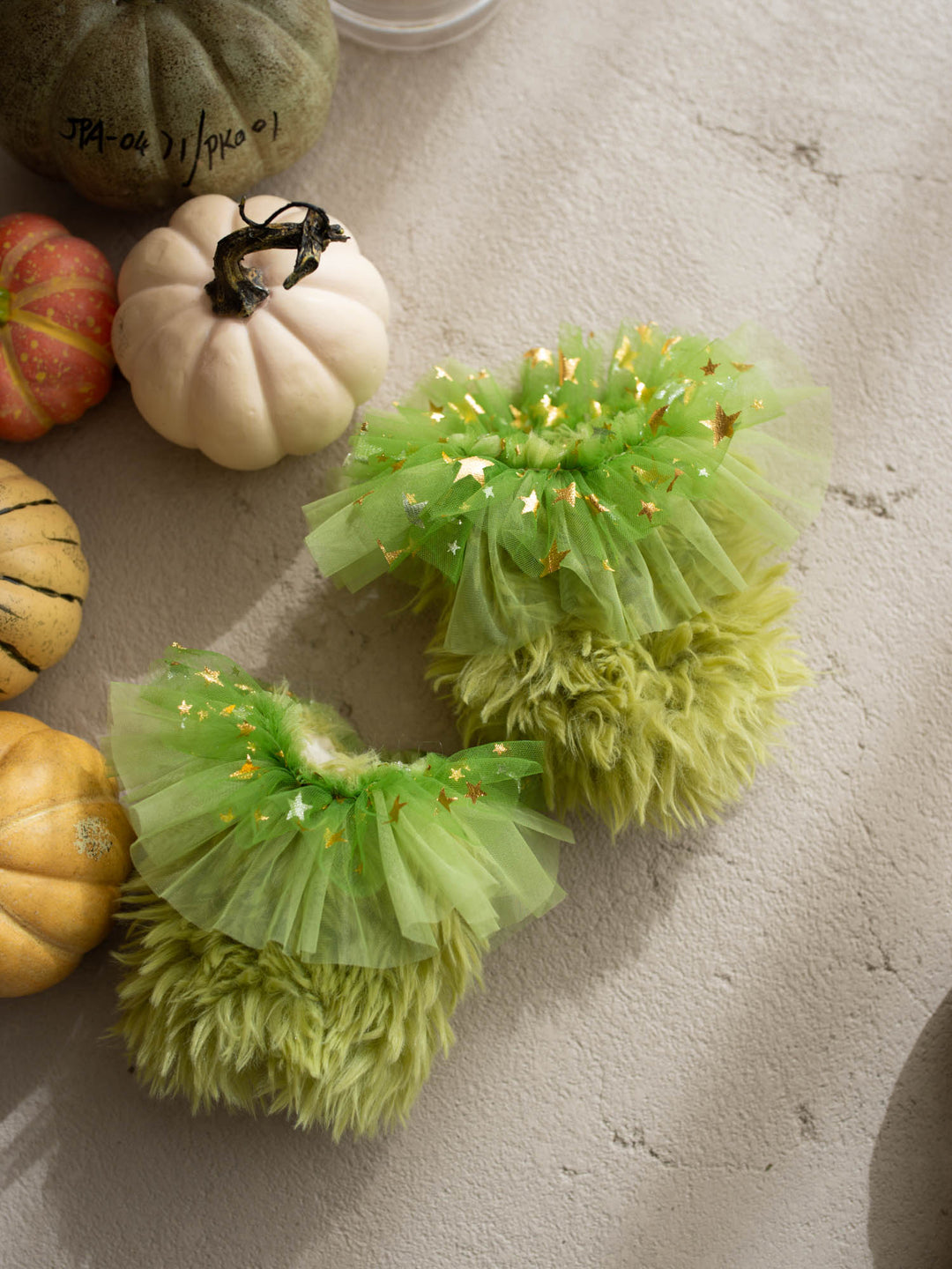 Little Grump green faux-fur baby leg warmers - Before & Ever Kids