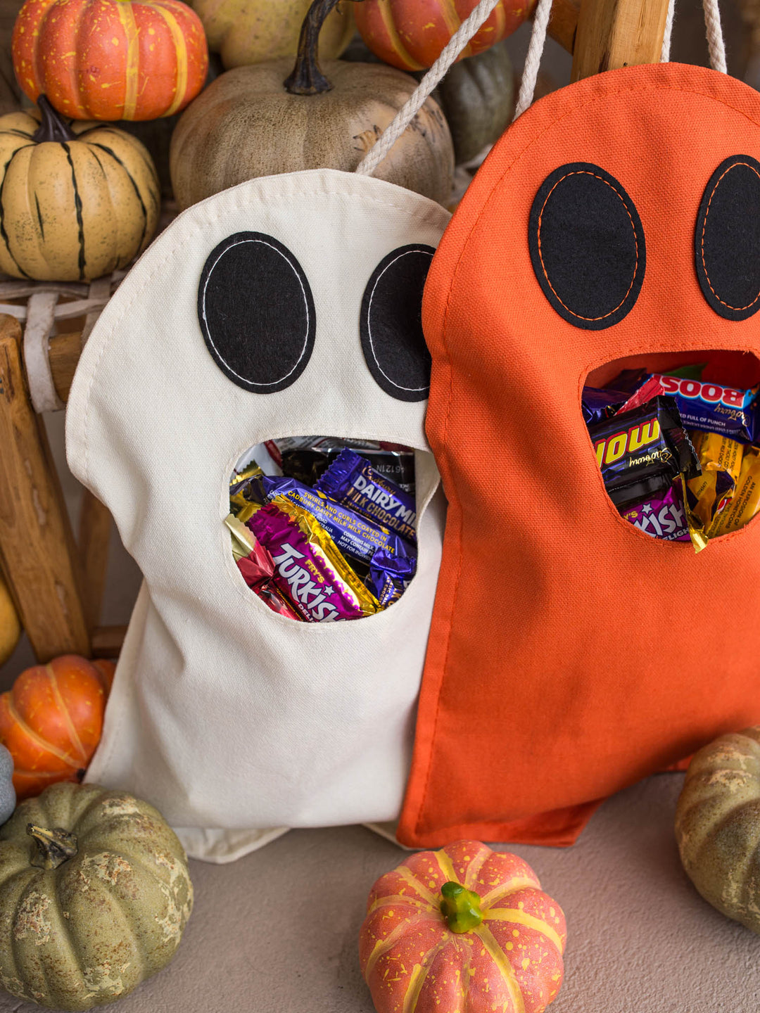 Little Gulp Ghost Treat Bag styled with autumn pumpkins - Before & Ever Kids