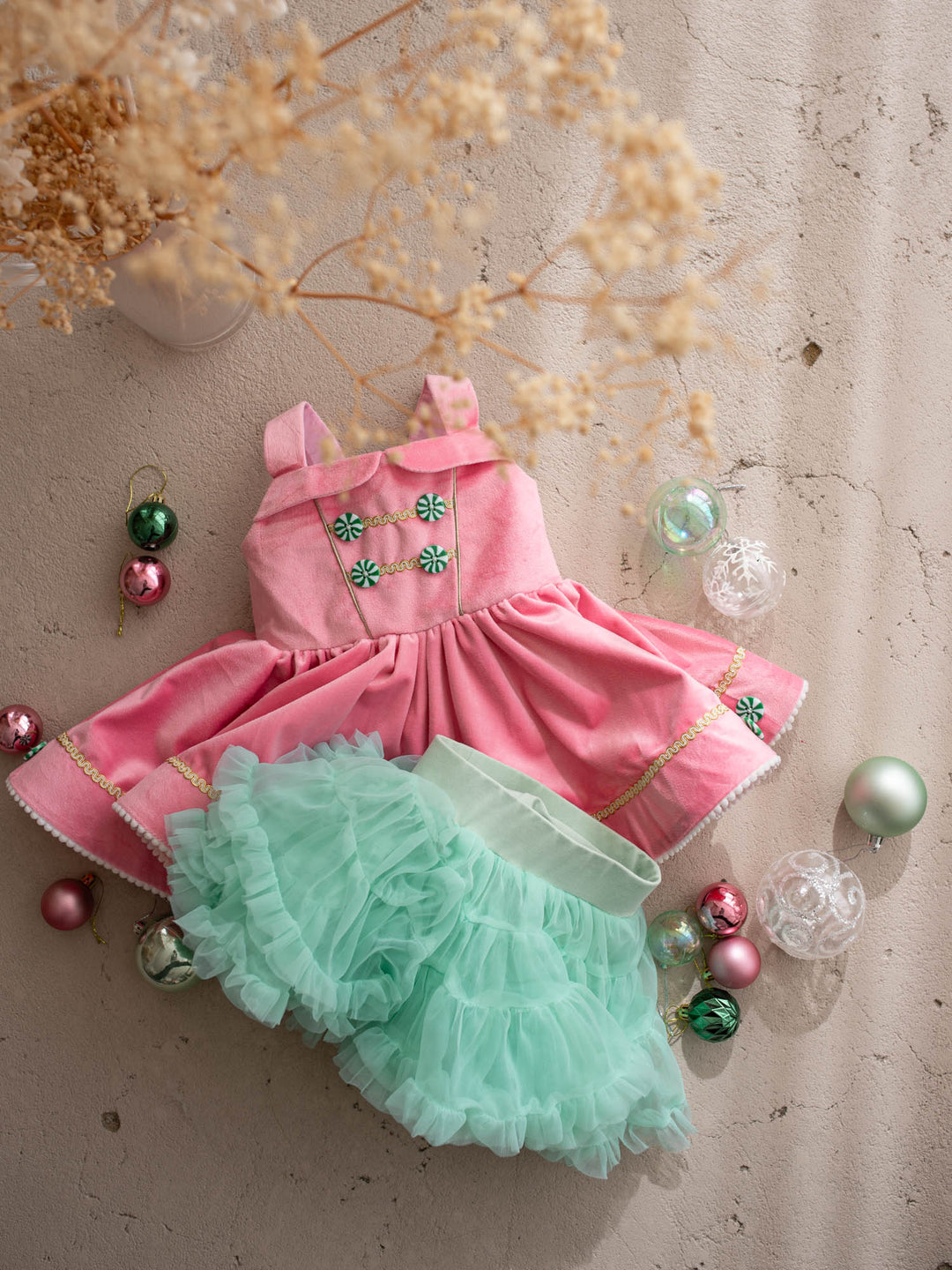Merry Berry pink and mint front view, pink velvet pinafore with peppermint buttons shown with its detachable mint tulle tutu skirt - Before & Ever Kids