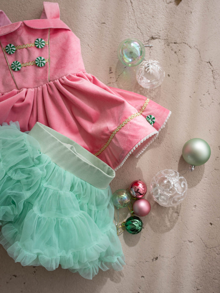 Merry Berry pink and mint pink velvet pinafore with peppermint buttons shown with its detachable mint tulle tutu skirt - Before & Ever Kids
