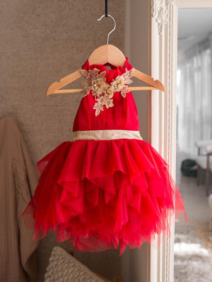 Merry Ever After red front view, red tulle dress with gold floral lace at the neckline and a gold sash - Before & Ever Kids
