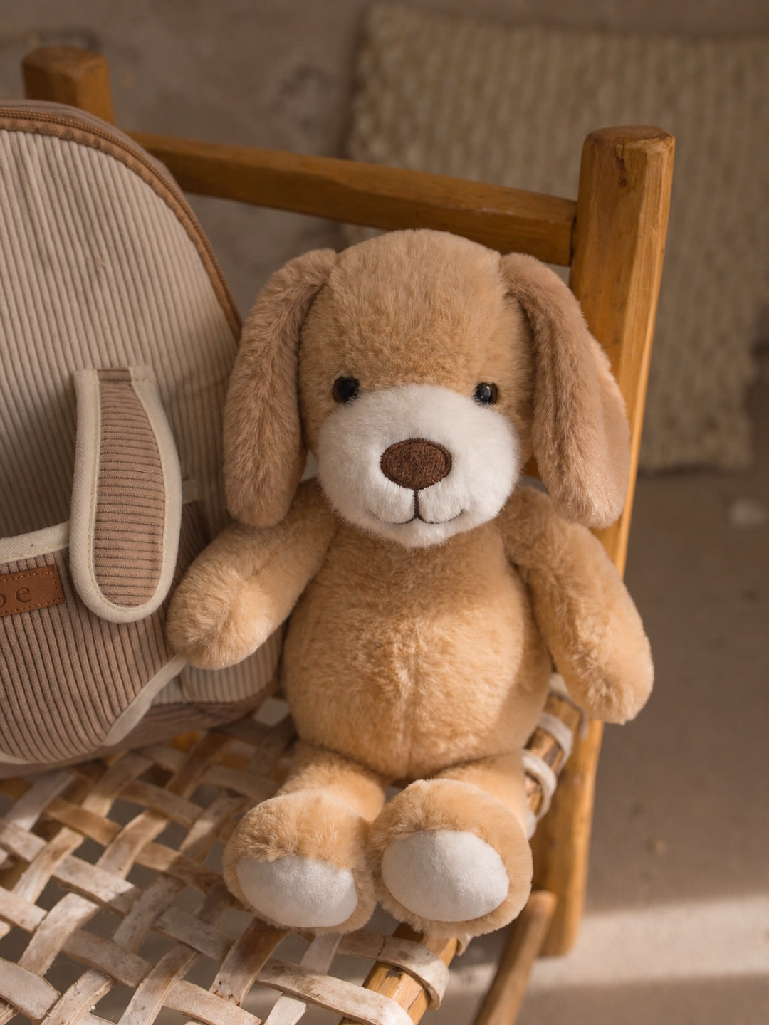 Milo the Puppy plush backpack for kids, plush puppy beside the corduroy backpack - Before & Ever Kids