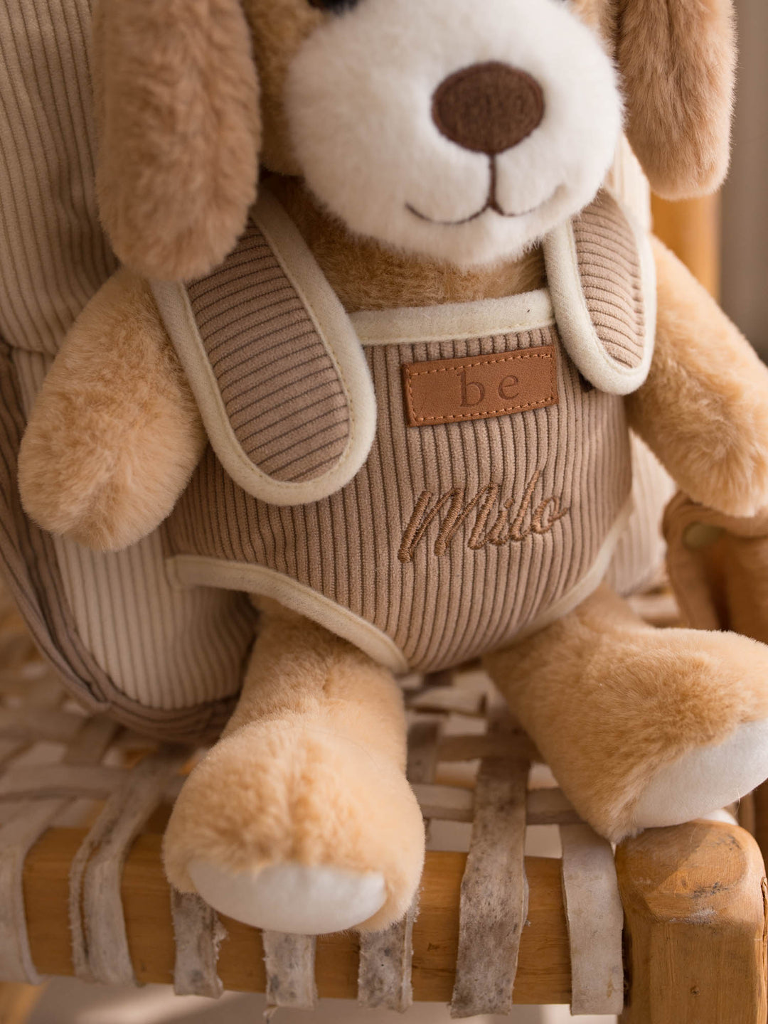 Milo the Puppy personalised plush backpack for kids, close up of the puppy face and corduroy front - Before & Ever Kids