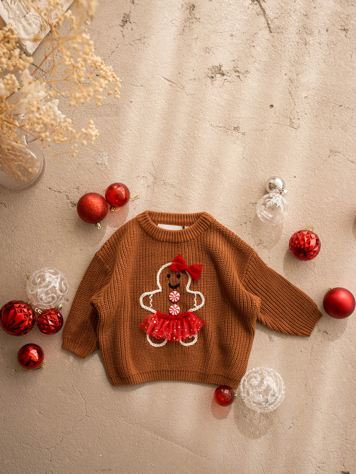 Miss Gingerbread Sweater brown front view, caramel chunky knit sweater with an embroidered gingerbread girl in a red tulle tutu - Before & Ever Kids