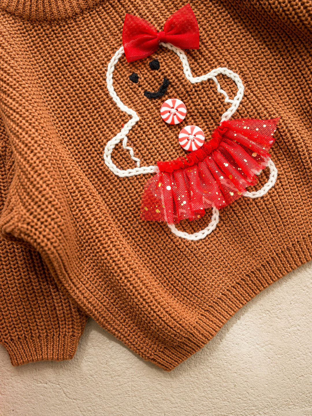 Miss Gingerbread Sweater brown caramel chunky knit sweater with an embroidered gingerbread girl in a red tulle tutu - Before & Ever Kids