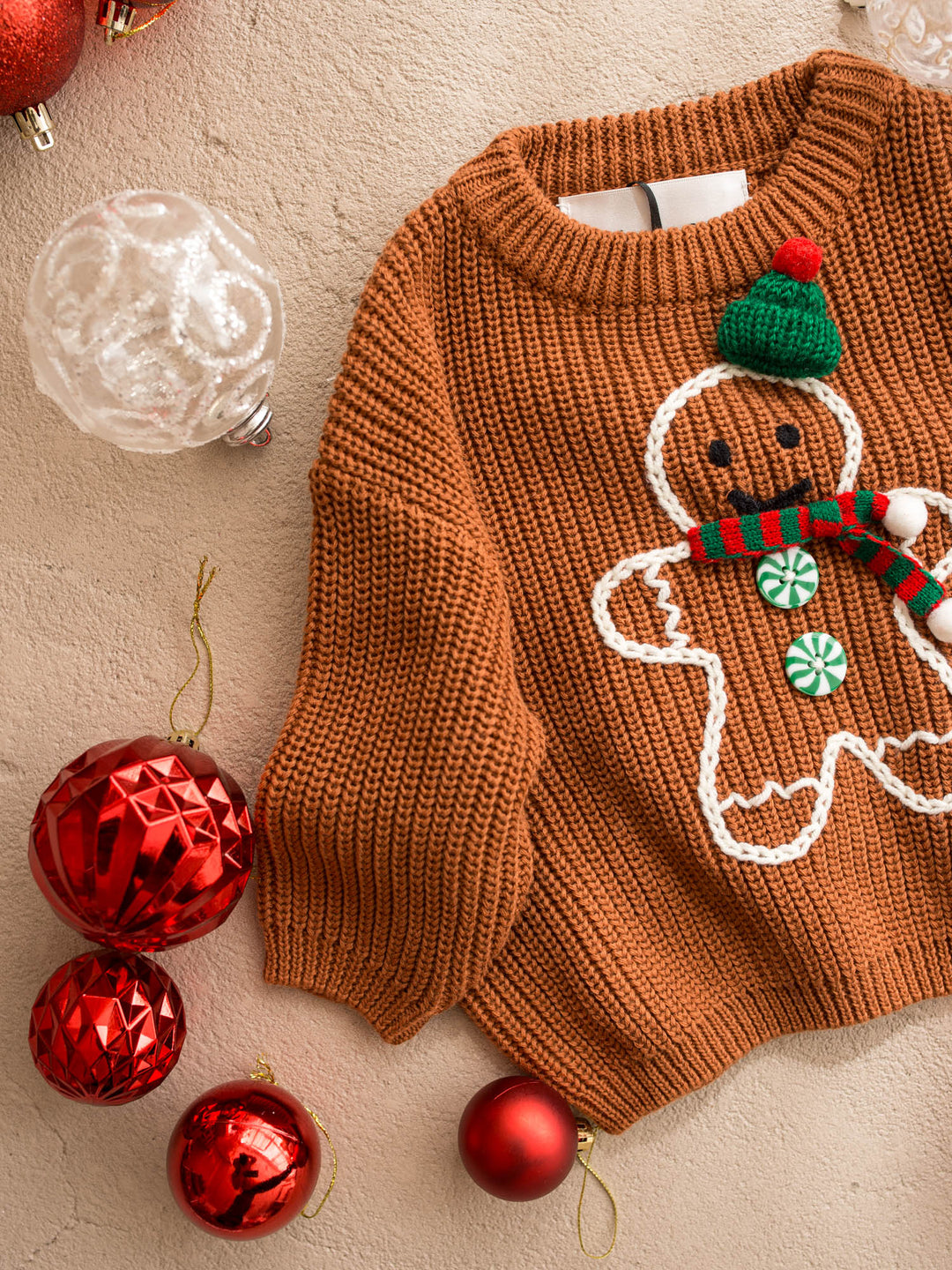 Mr Gingerbread Sweater brown caramel chunky knit sweater with an embroidered gingerbread boy in a green beanie and striped scarf - Before & Ever Kids