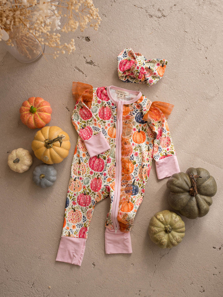 Patch Perfect pumpkin floral baby girl onesie flat lay with matching topknot headwrap - Before & Ever Kids