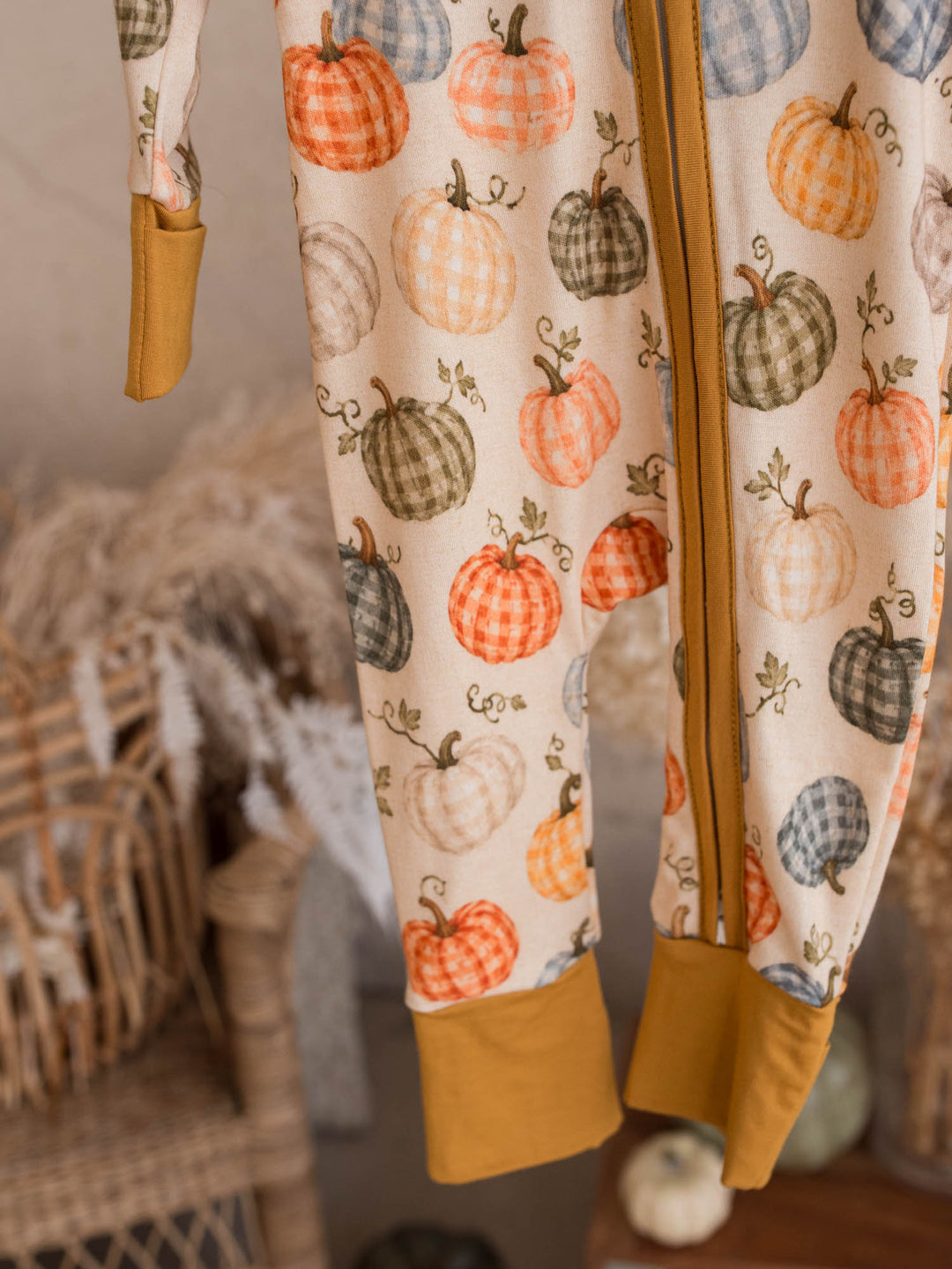 Patch Ready onesie detail showing mustard cuffs and gingham pumpkin print - Before & Ever Kids