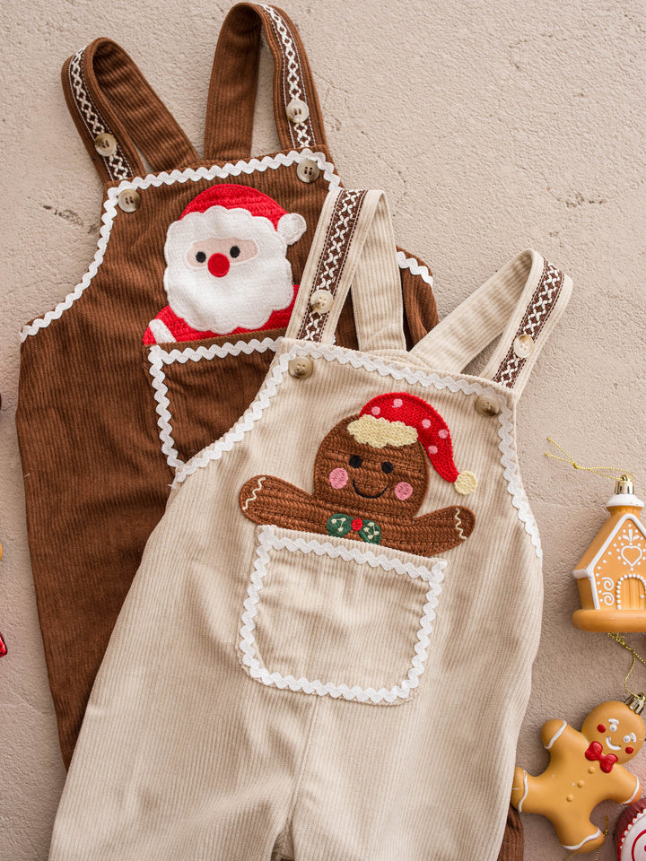 Peekaboo Overall in Santa, chocolate cotton corduroy overall with a Santa face pocket, beside the cream gingerbread Peekaboo overall - Before & Ever Kids
