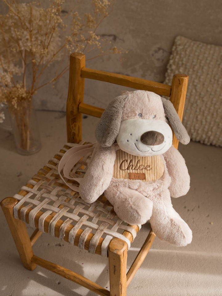Pip the Puppy personalised plush backpack for kids, plush puppy sidekick backpack sitting on a chair - Before & Ever Kids