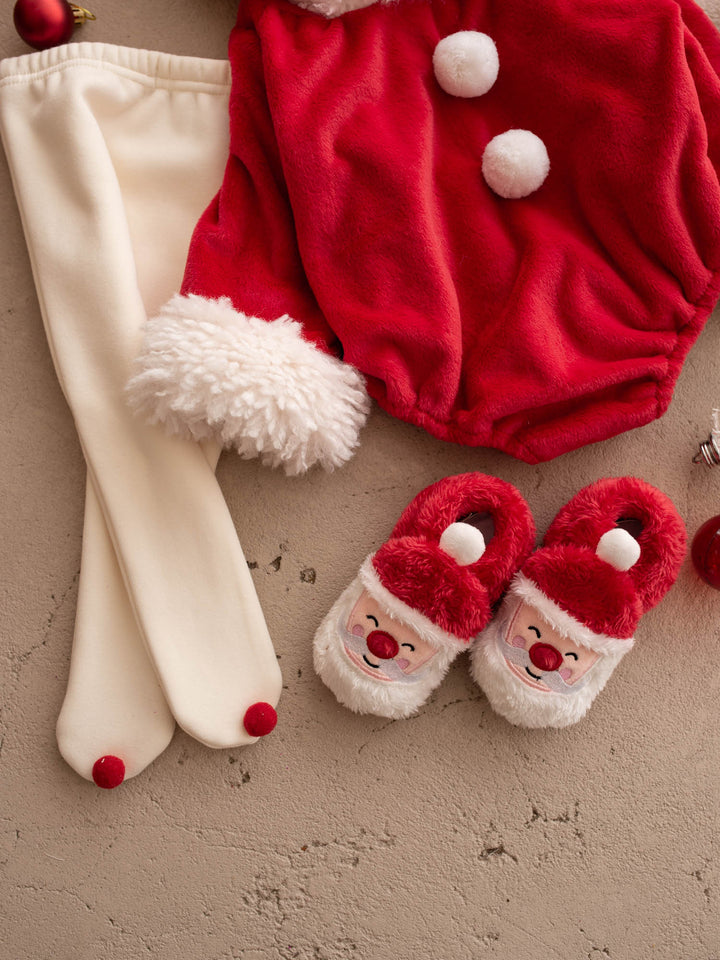 Santa Baby Slippers with the Santa Baby Romper, flat lay - Before & Ever Kids