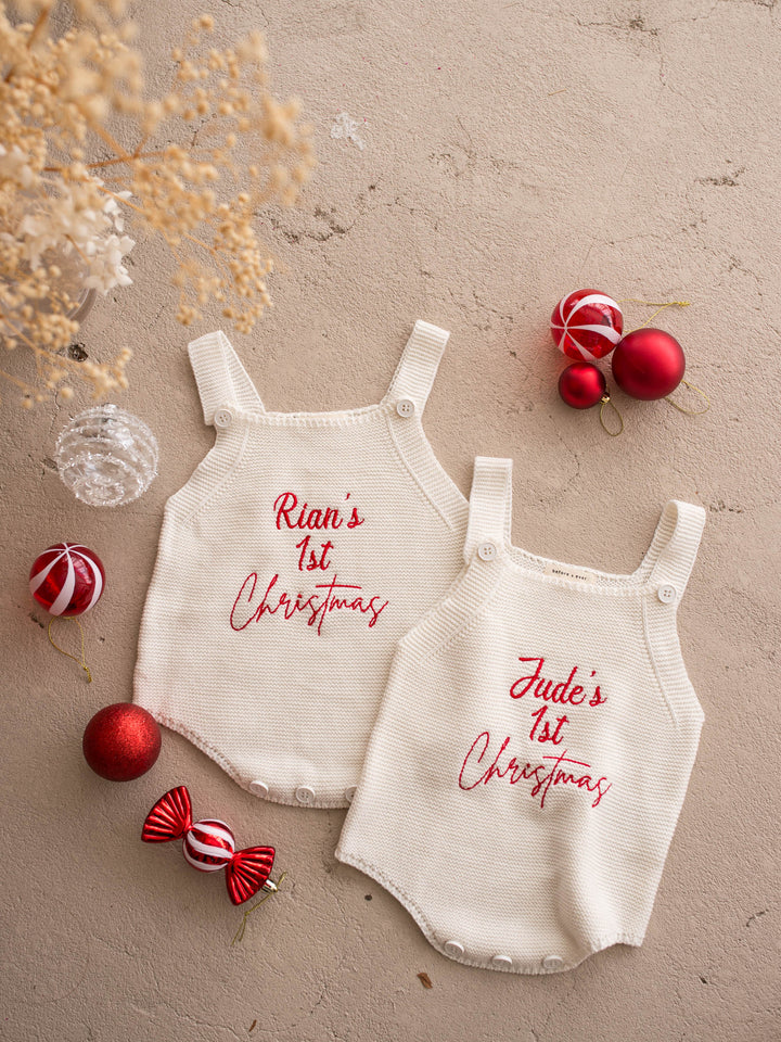 Say My Name Christmas Singlet Romper in milk cotton knit with a personalised name in red, two personalised rompers laid flat together - Before & Ever Kids