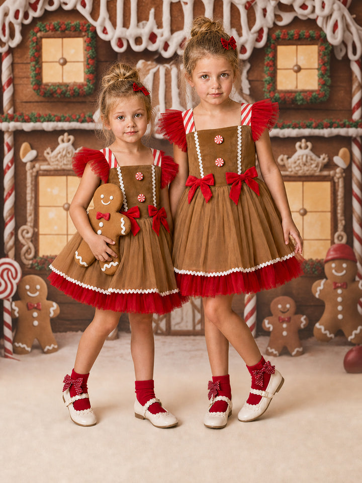Sugar & Spice brown and red model photo, two girls in gingerbread brown velvet bodices with peppermint buttons, candy stripe straps and red tulle flutter sleeves over caramel and red tulle skirts - Before & Ever Kids