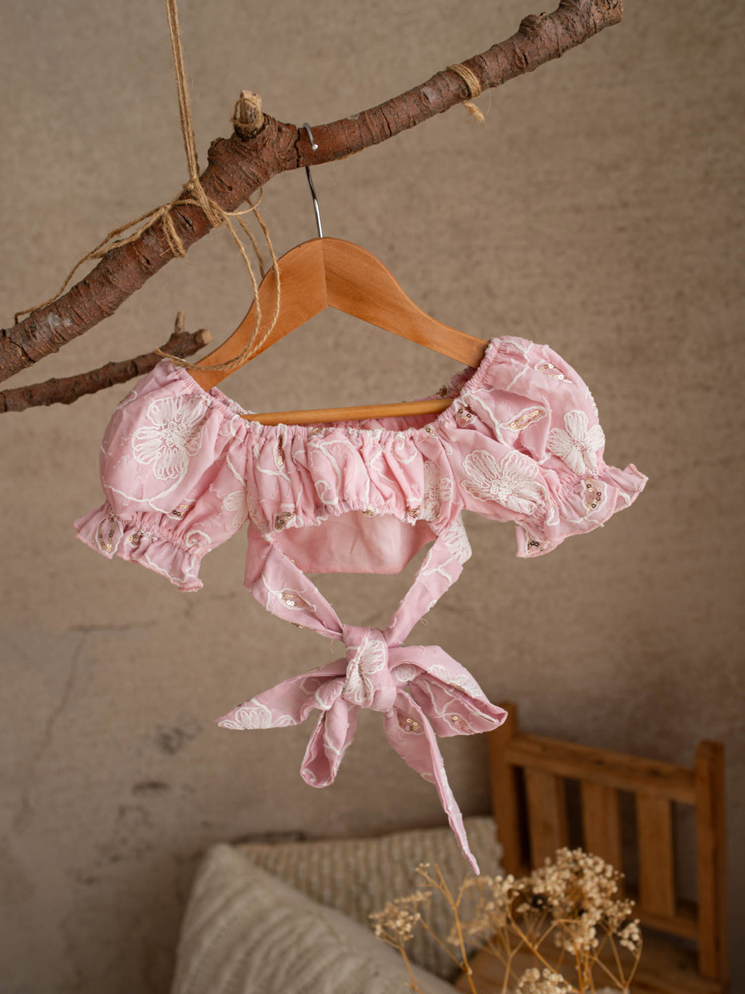 Where Summer Blooms baby pink baby girl set with white floral embroidery, gold sequins, puff sleeves and a bubble-hem skort.