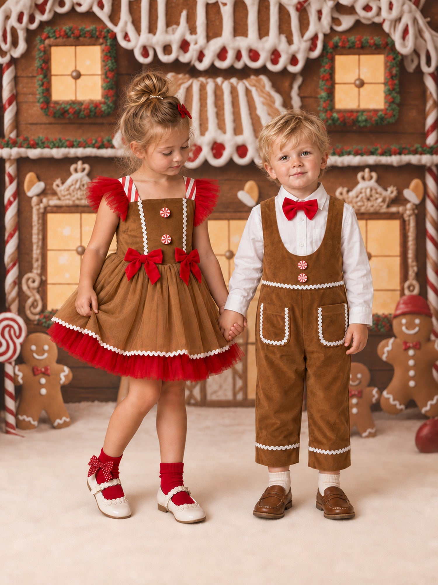 Boy in Catch Me If You Can overalls beside a girl in the matching Sugar and Spice dress